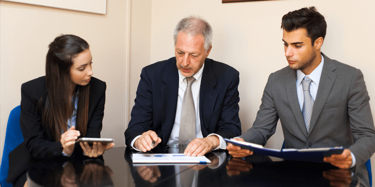 Employees of a nonprofit organization having a discussion in a professional setting